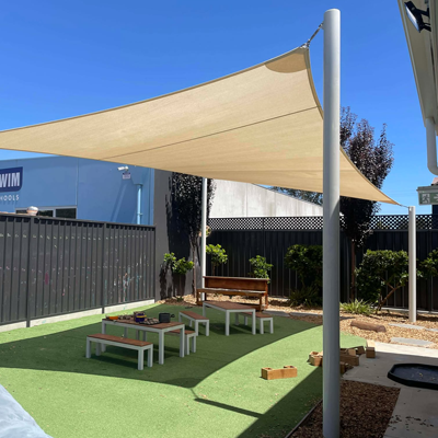 Shaded preschool playground designed for outdoor learning and play