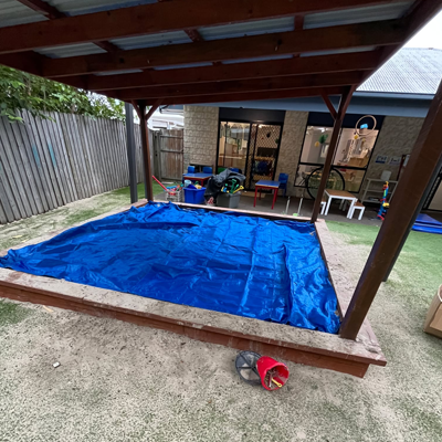 Preschool sandpit covered using our custom made sandpit covers